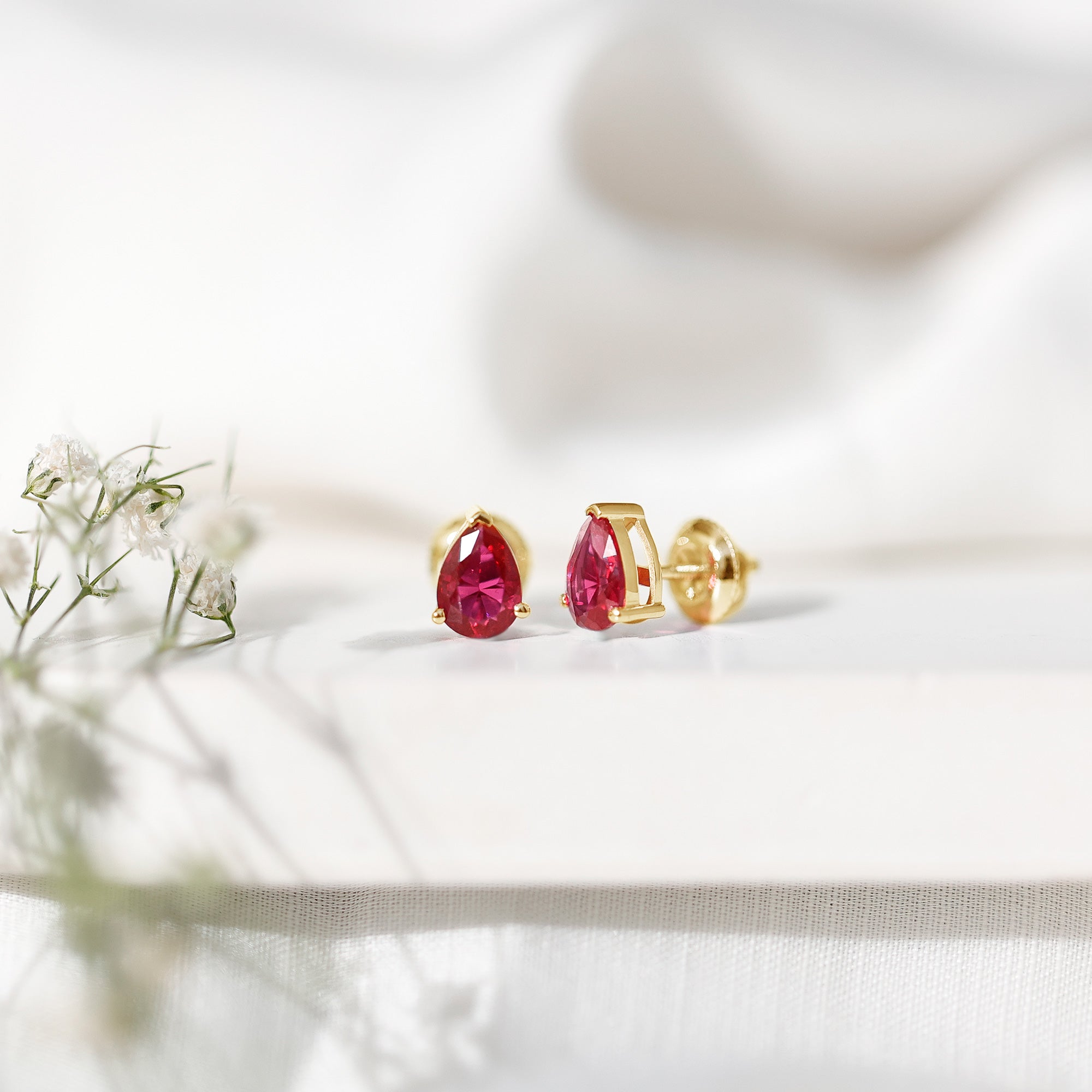 Solitaire 1.5 Carat Pear Shaped Lab Created Ruby Stud Earrings AAAA - Rosec Jewels