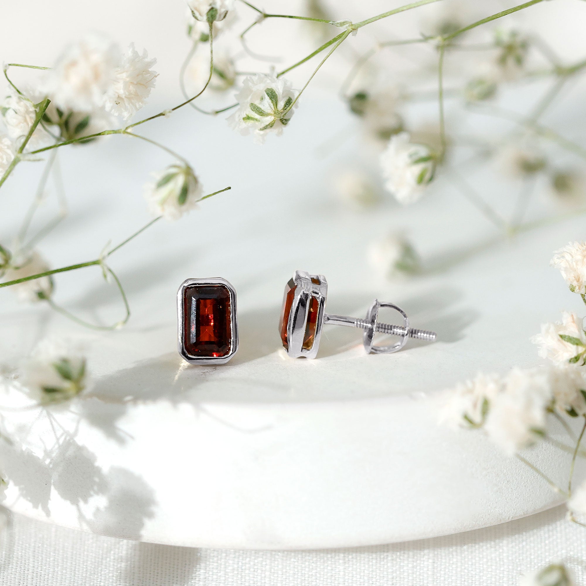 1.5 CT Emerald Cut Garnet Solitaire Stud Earrings in Bezel Setting AAA - Rosec Jewels