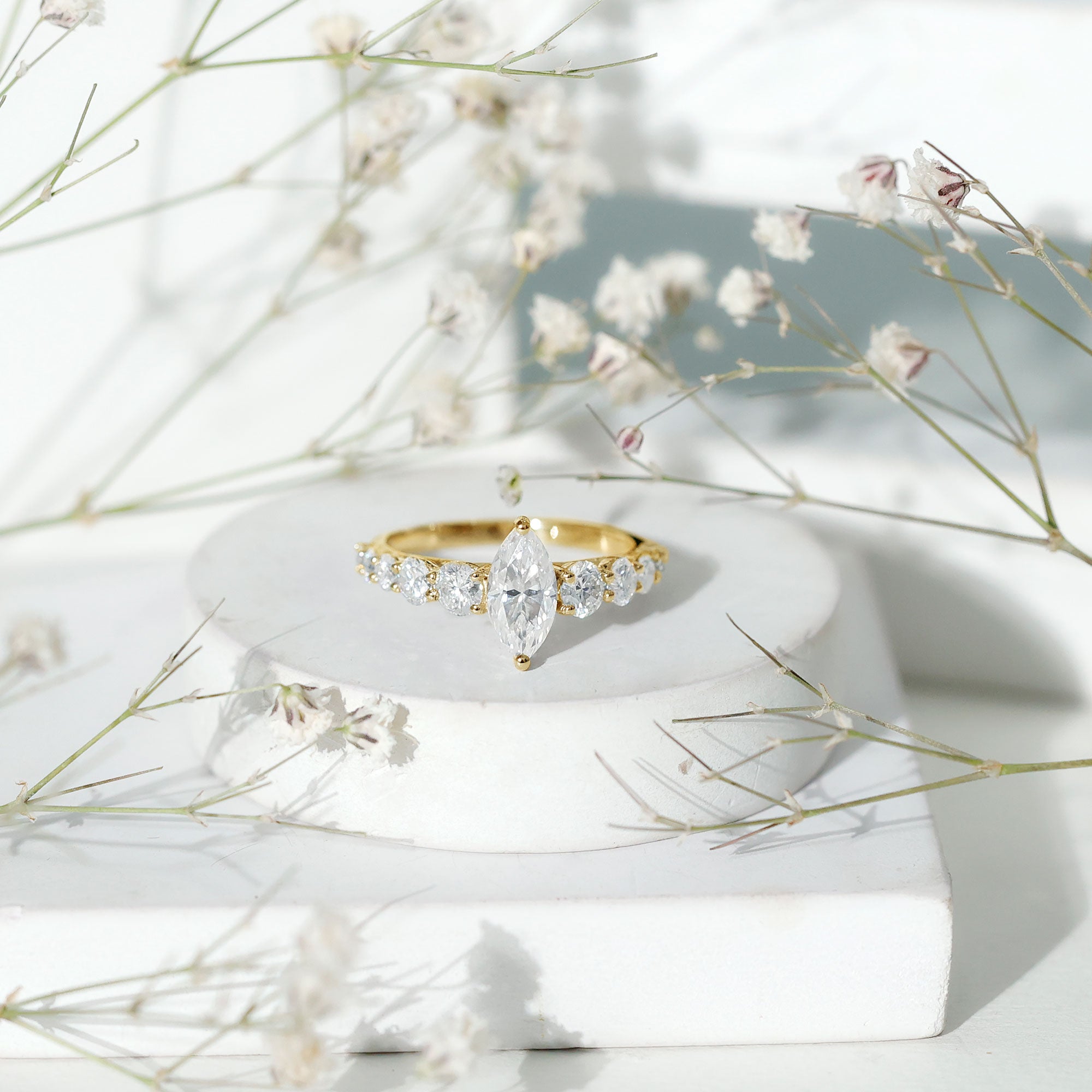 Rosec Jewels-Marquise Moissanite Engagement Ring With Side Stones
