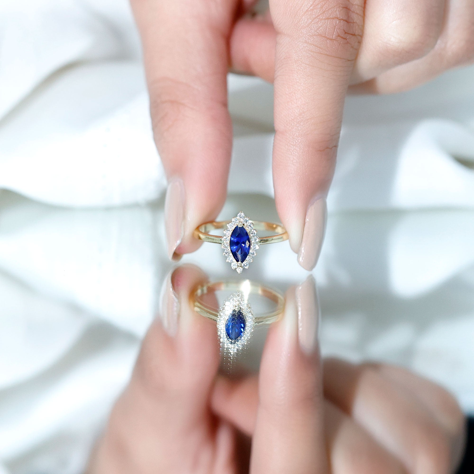 Rosec Jewels-Marquise Cut Lab Grown Blue Sapphire and Diamond Halo Engagement Ring