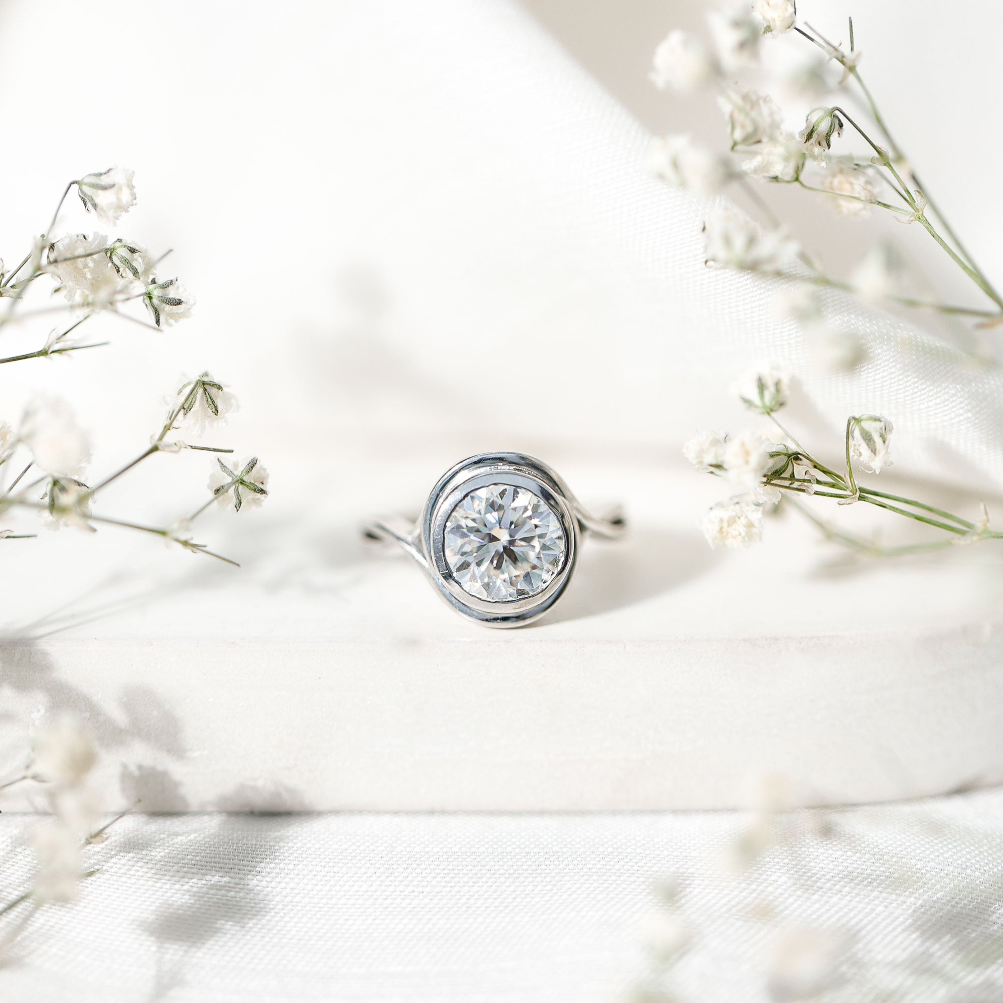 Rosec Jewels-Certified Moissanite Bezel Set Engagement Ring with Crossover Shank