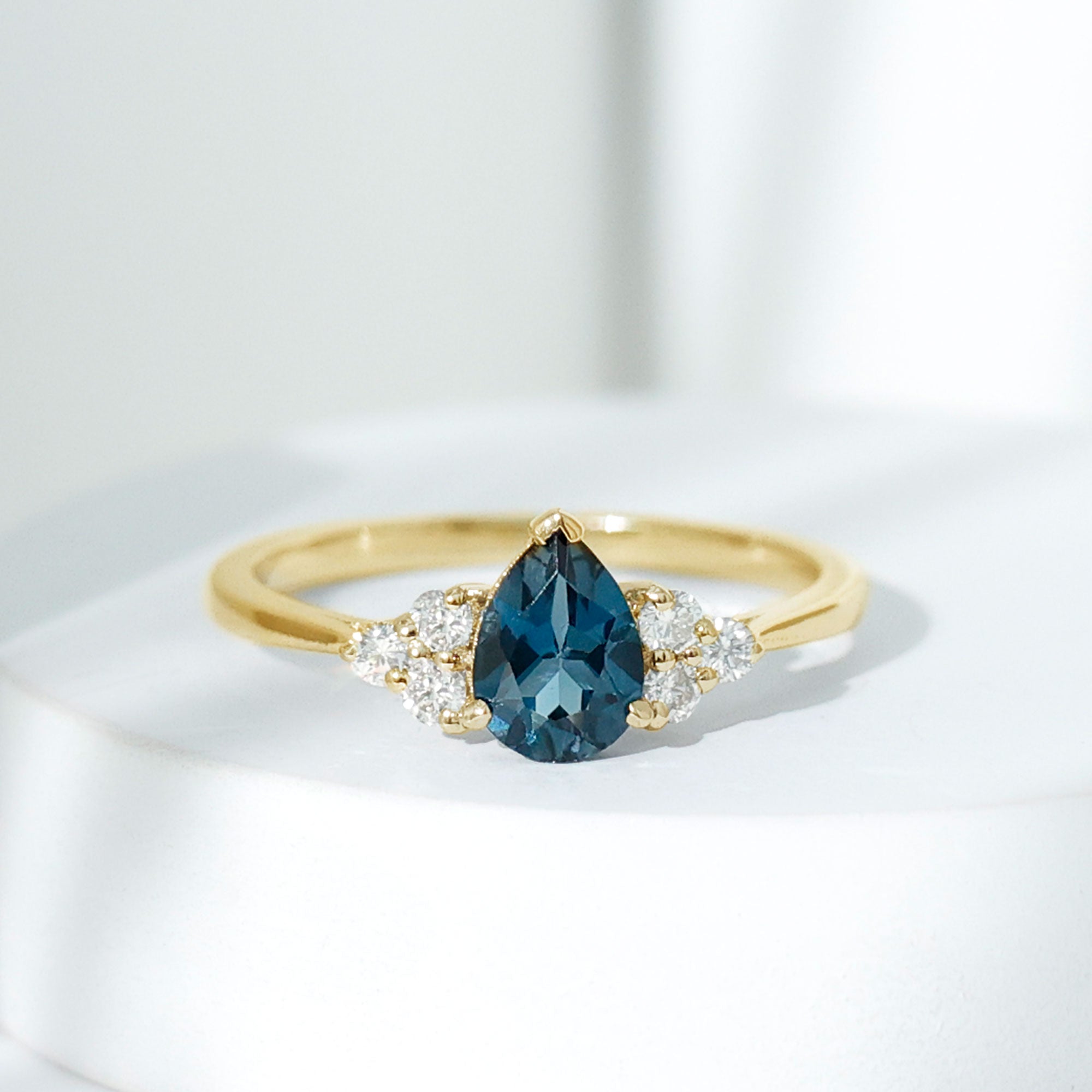 5X7mm Pear Shape London Blue Topaz Engagement Ring with Diamond Trio AAA - Rosec Jewels