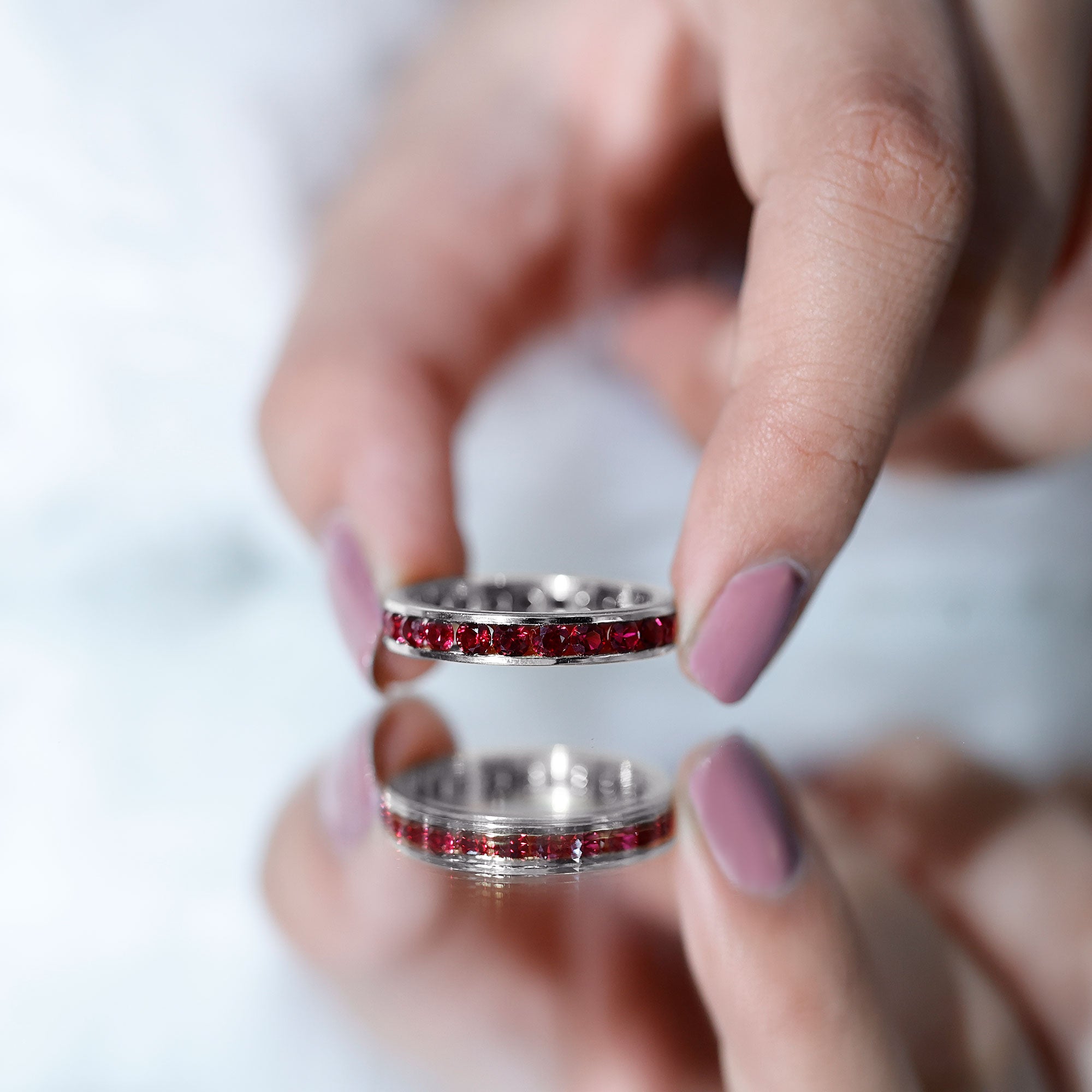 Rosec Jewels-Round Created Ruby Full Eternity Ring in Channel Setting