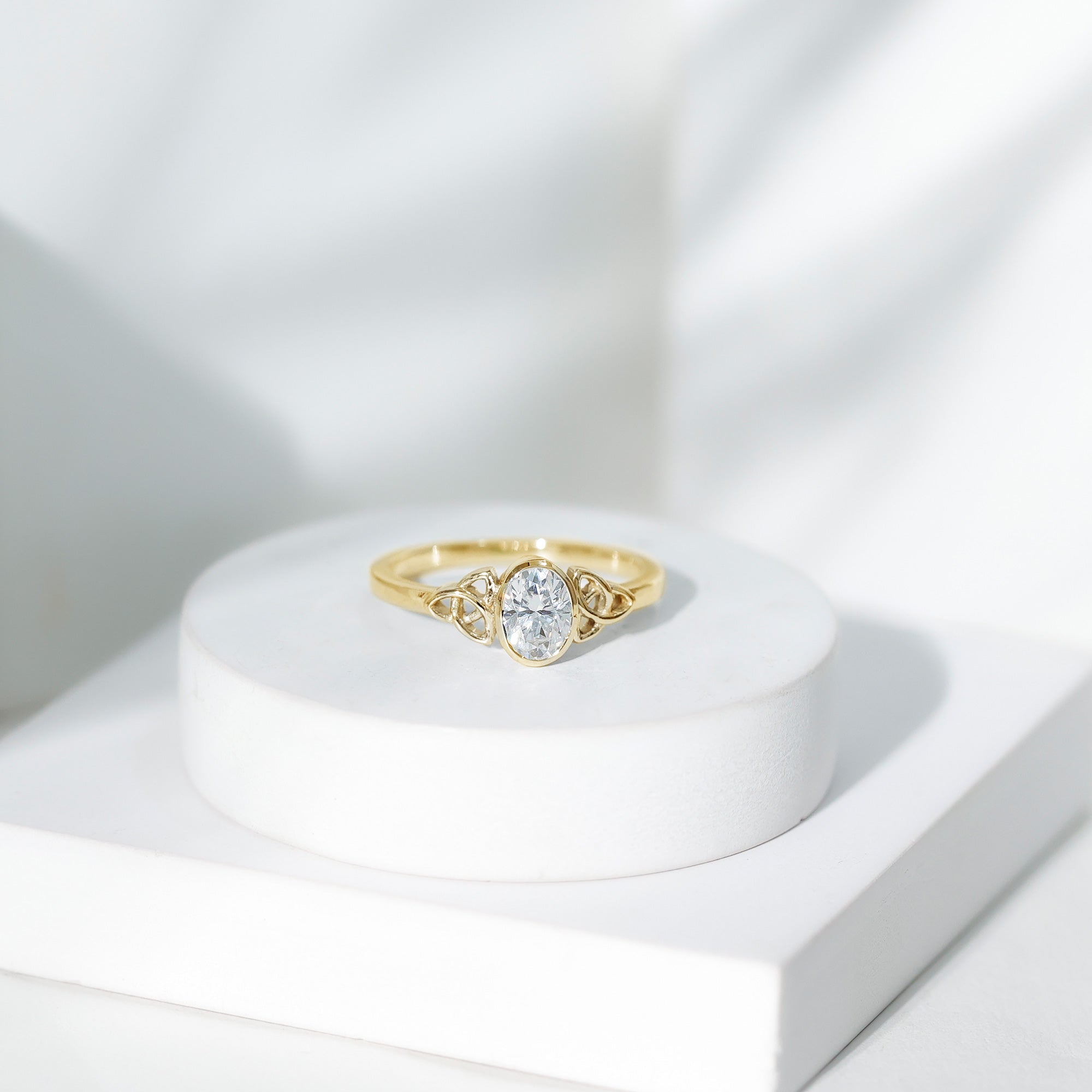 Oval Moissanite Solitaire Celtic Knot Ring in Bezel Setting D-VS1 - Rosec Jewels