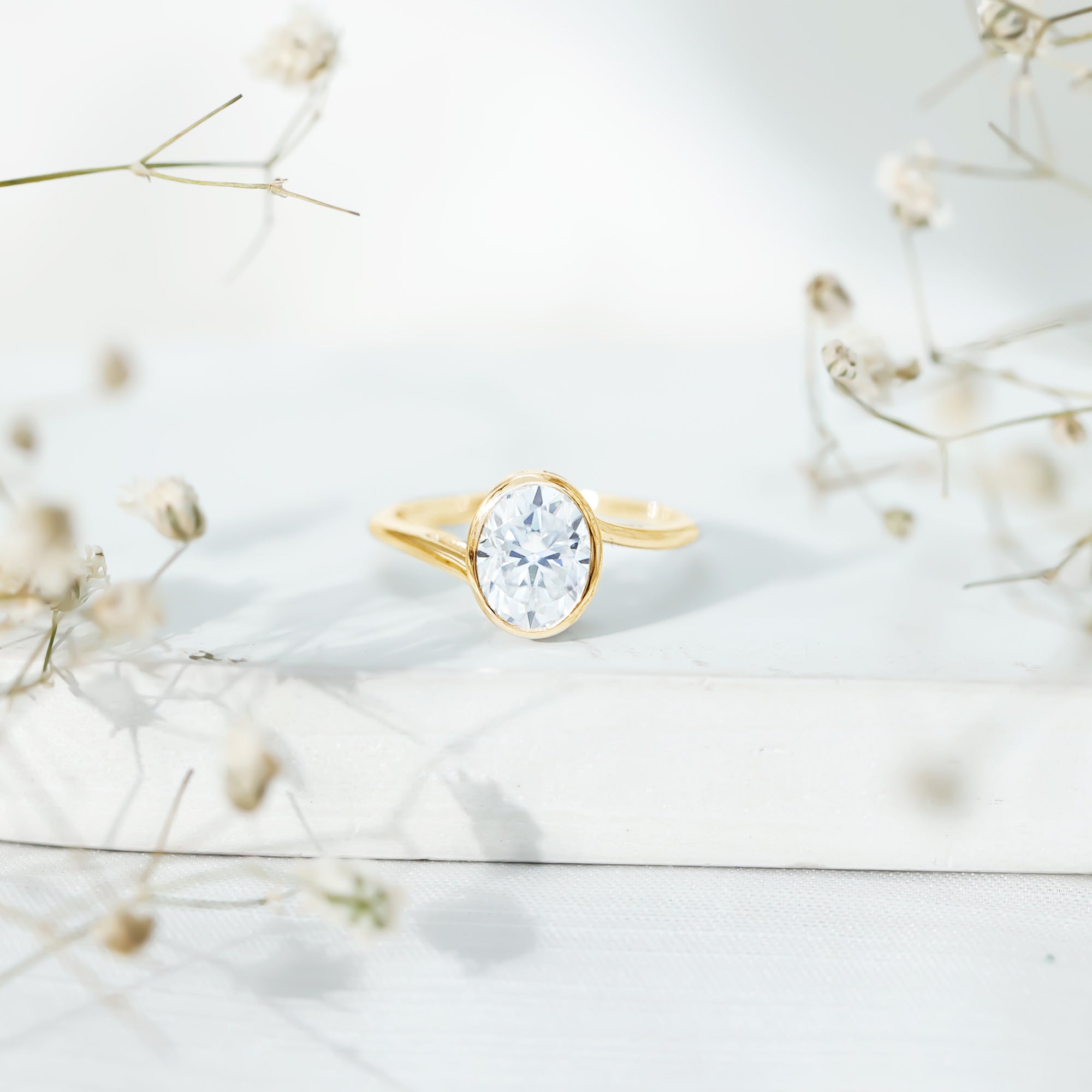 Rosec Jewels-Solitaire 7X9 MM Moissanite Oval Engagement Ring with Bypass Shank
