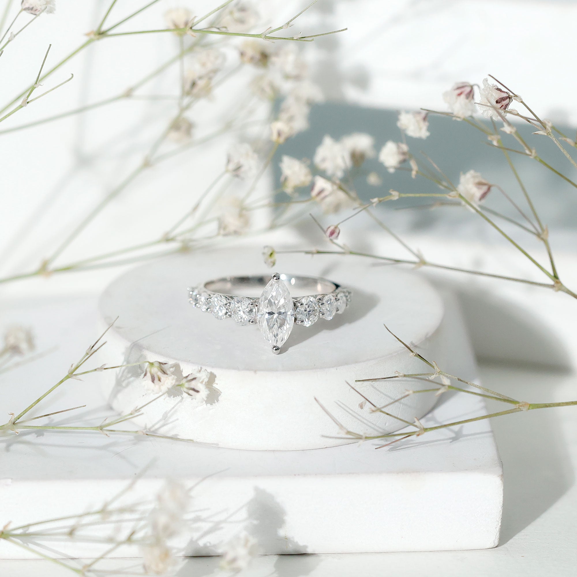 Rosec Jewels-Marquise Moissanite Engagement Ring With Side Stones