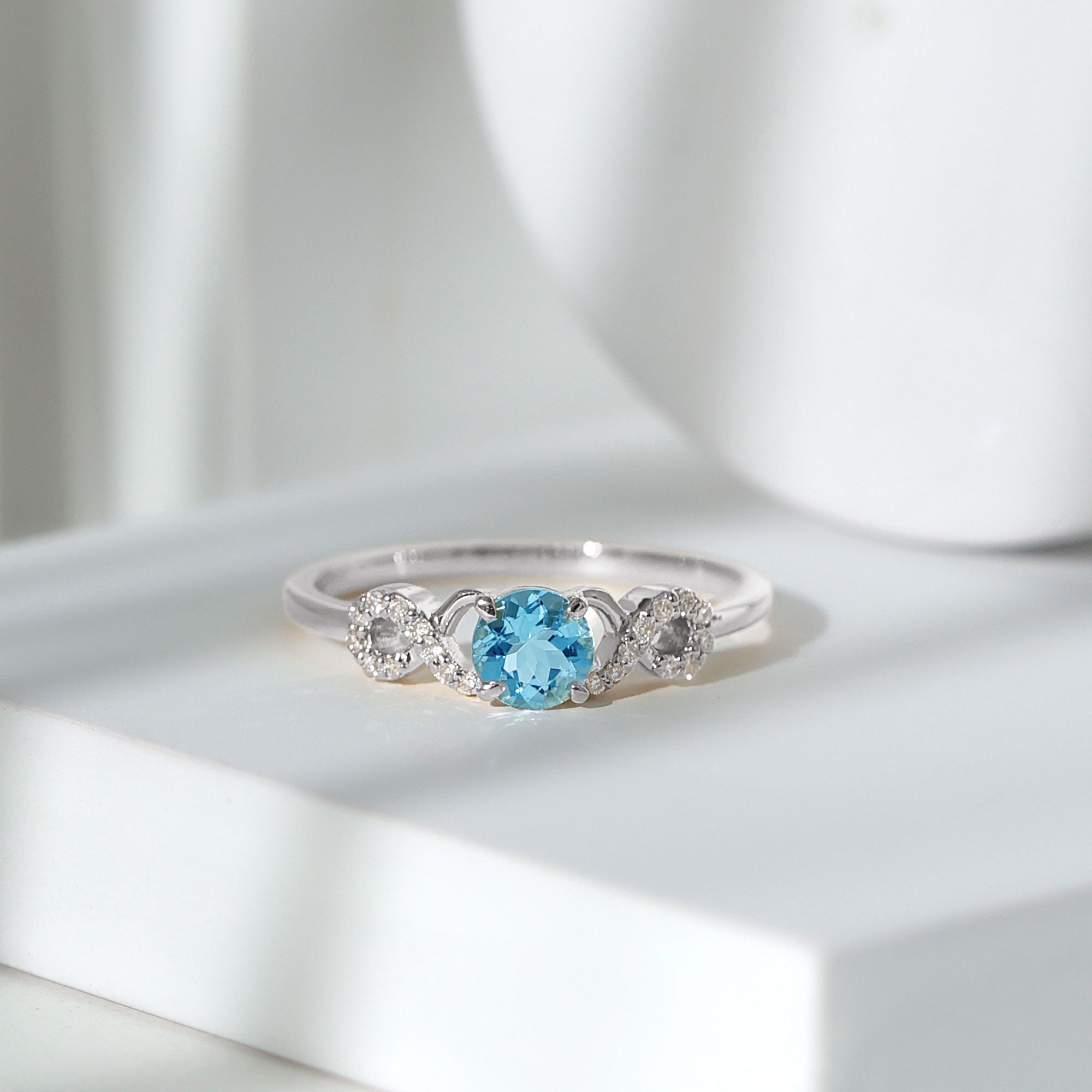 Rosec Jewels-Round Shape Aquamarine and Diamond Infinity Engagement Ring