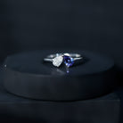 Rosec Jewels-Pear Shaped Tanzanite Moissanite Two Stone Promise Ring in Silver