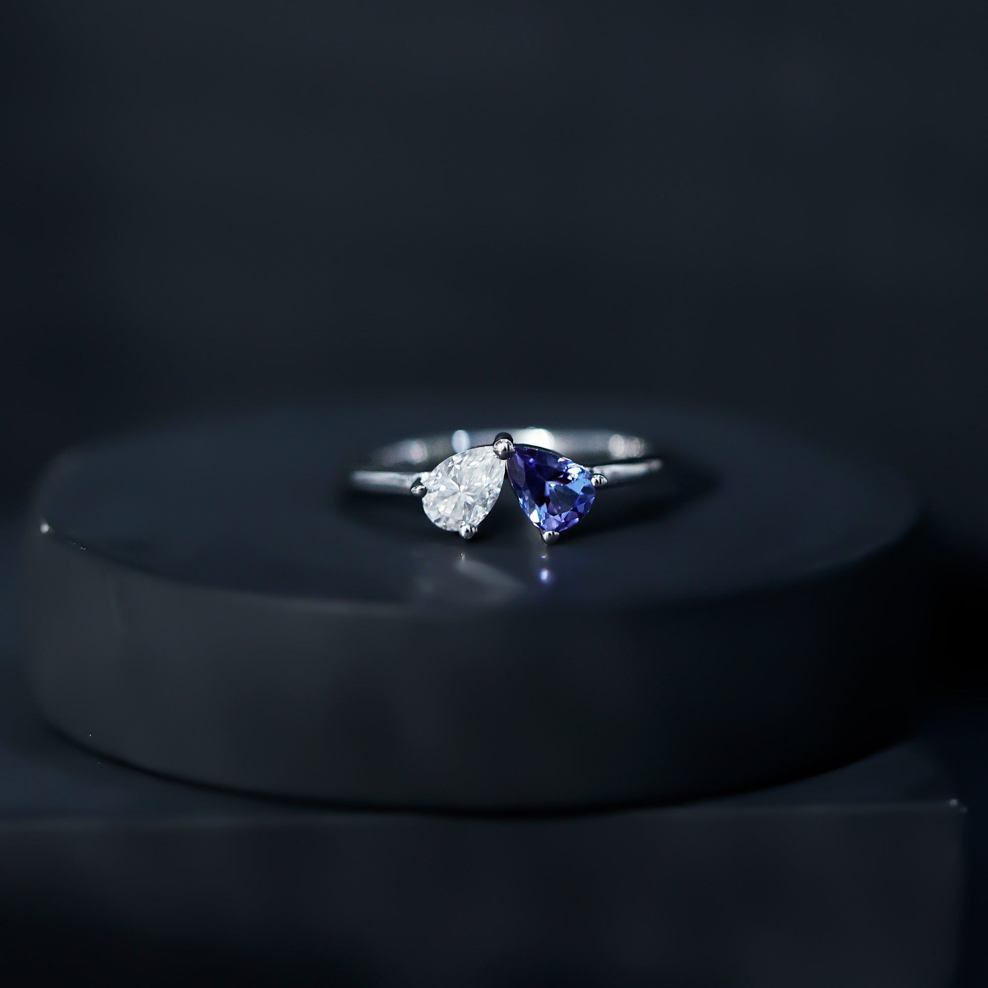 Rosec Jewels-Pear Shaped Tanzanite Moissanite Two Stone Promise Ring in Silver