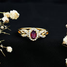 Rosec Jewels-Oval Rhodolite Garnet and Diamond Criss Cross Engagement Ring