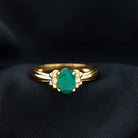 Rosec Jewels-Oval Cut Emerald Solitaire Engagement Ring with Bow Design