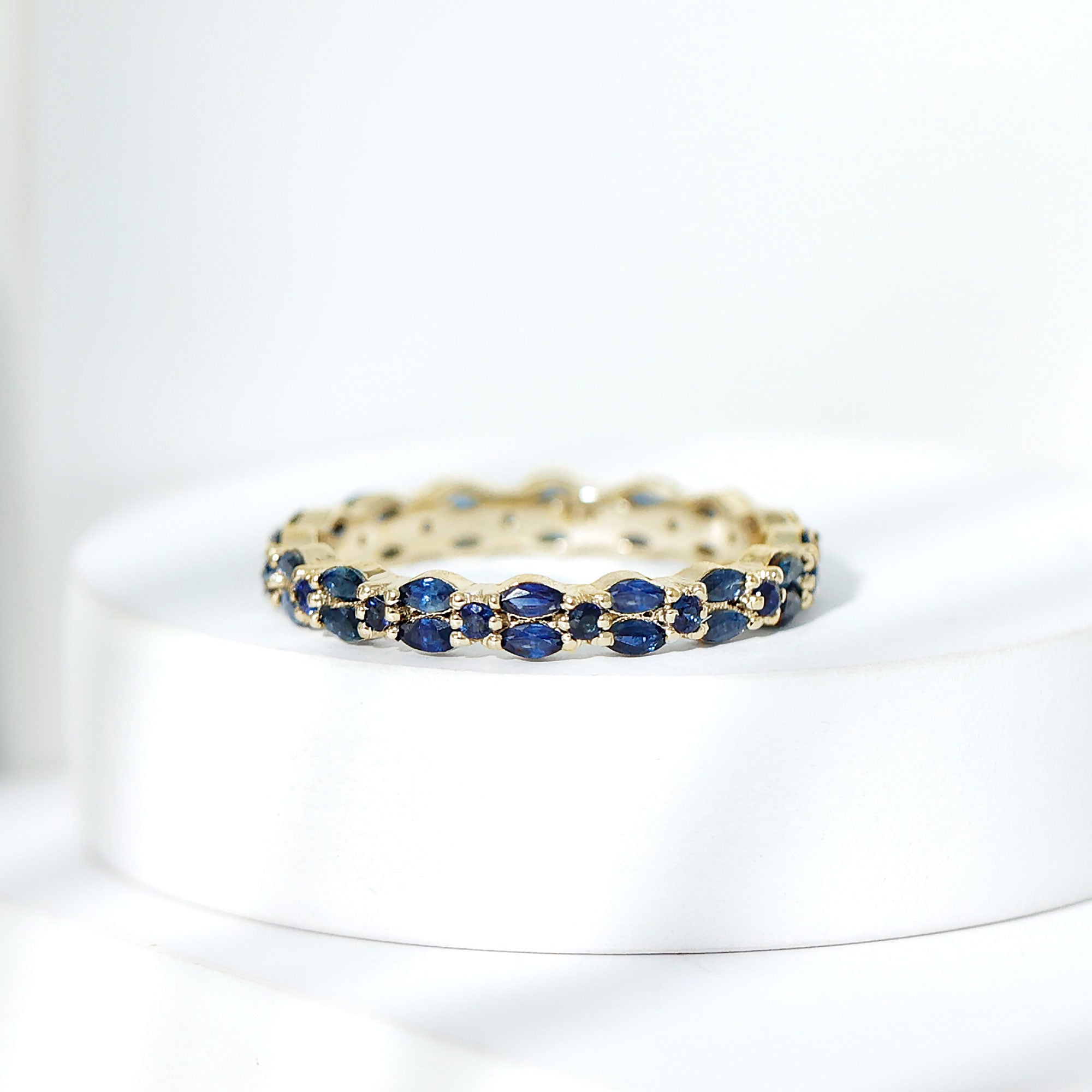Rosec Jewels-1.5 CT Marquise and Round Blue Sapphire Contemporary Full Eternity Ring