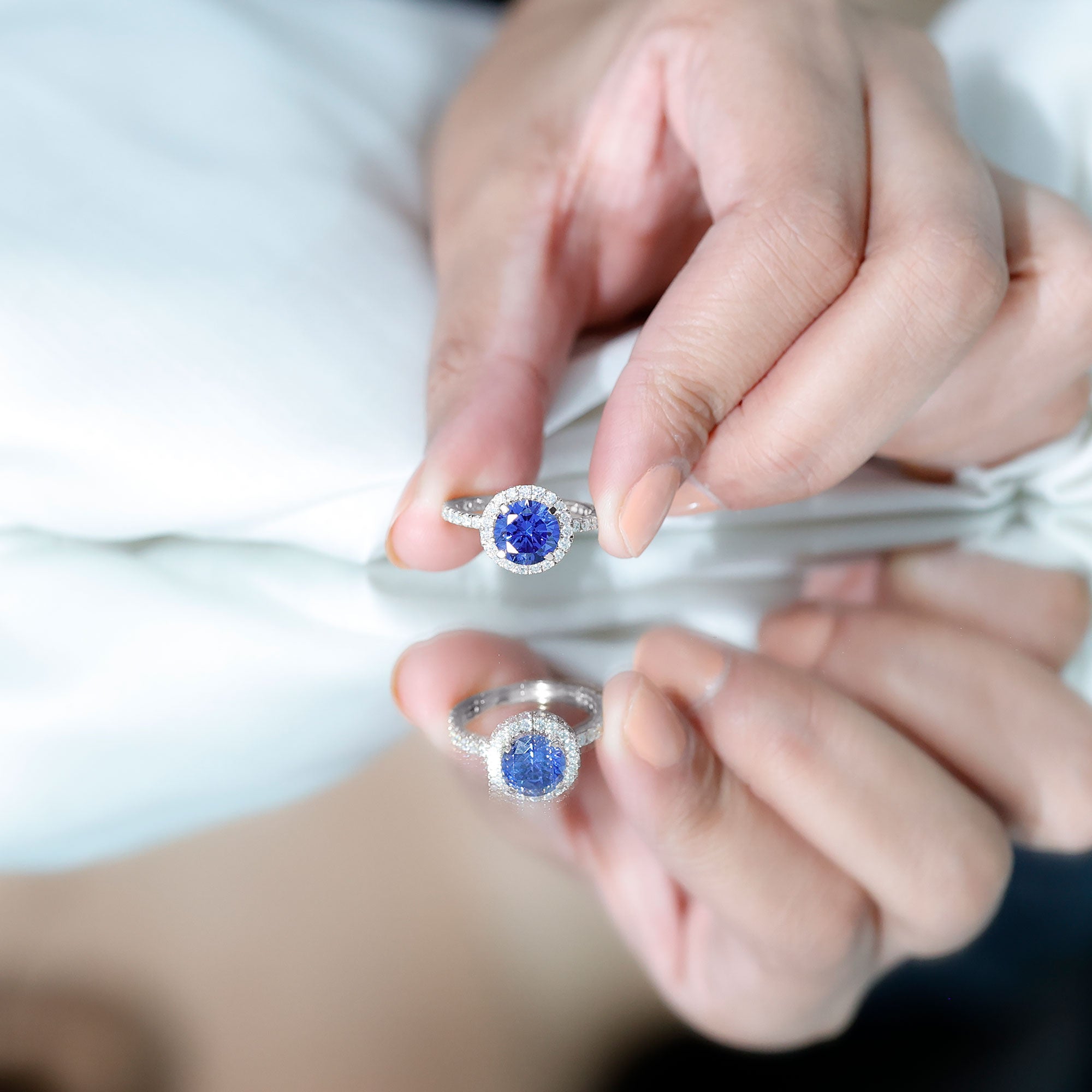 Diamond ring with sapphire halo clearance