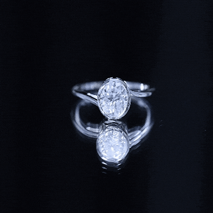 Rosec Jewels-Solitaire 7X9 MM Moissanite Oval Engagement Ring with Bypass Shank