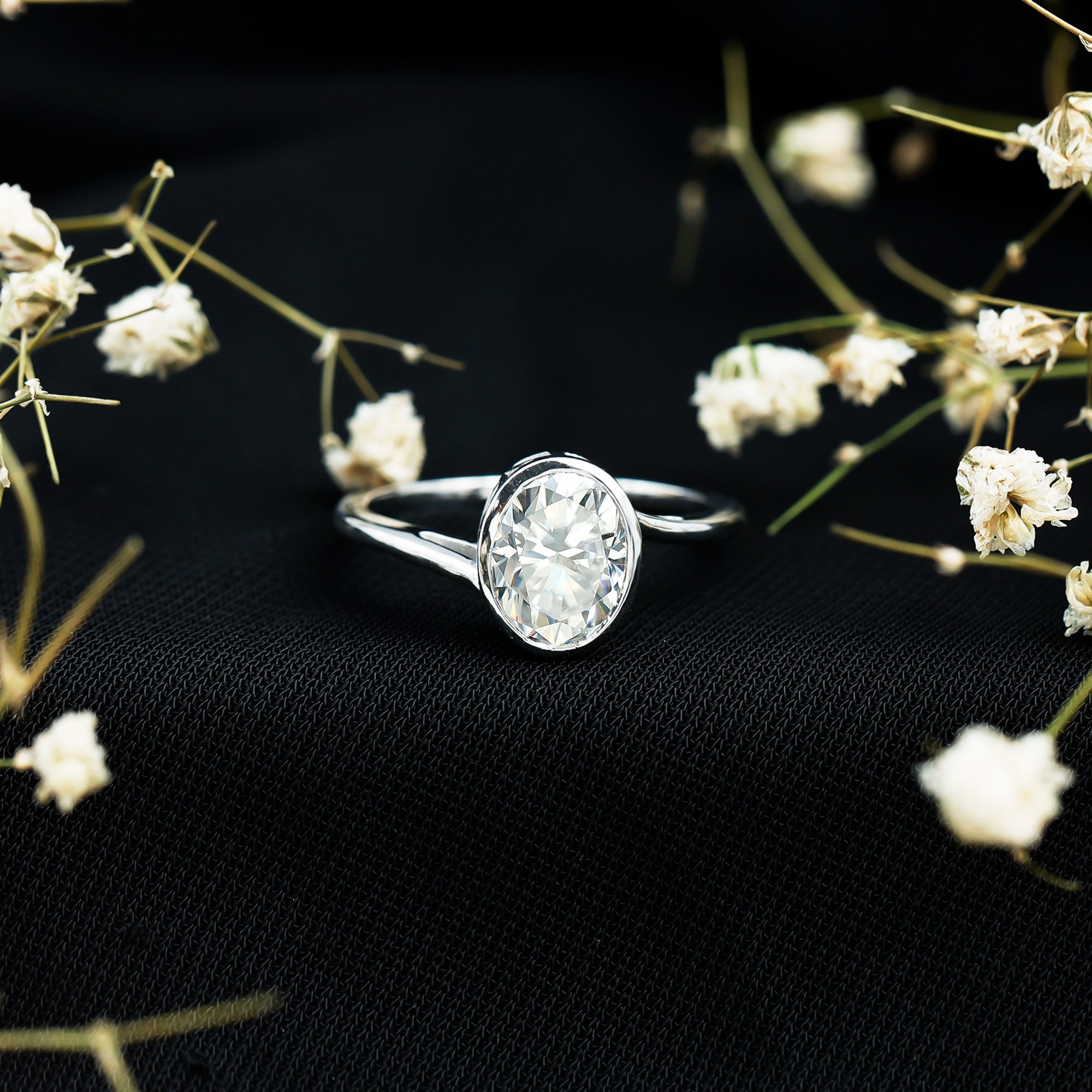 Rosec Jewels-Solitaire 7X9 MM Moissanite Oval Engagement Ring with Bypass Shank