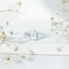 Rosec Jewels-Solitaire 7X9 MM Moissanite Oval Engagement Ring with Bypass Shank