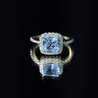 Rosec Jewels-Cushion Cut Sky Blue Topaz and Diamond Halo Engagement Ring