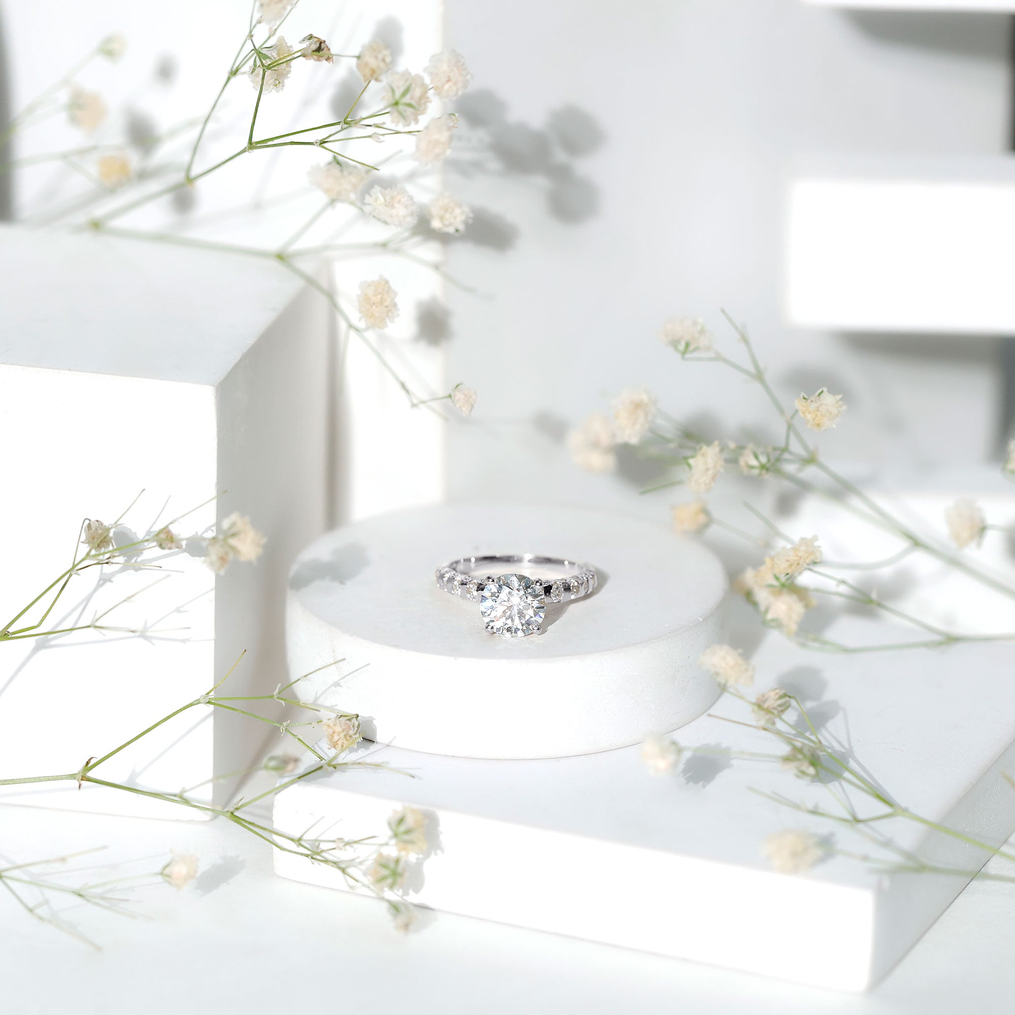 Rosec Jewels-Round Cut Moissanite Solitaire Engagement Ring with Side Stones